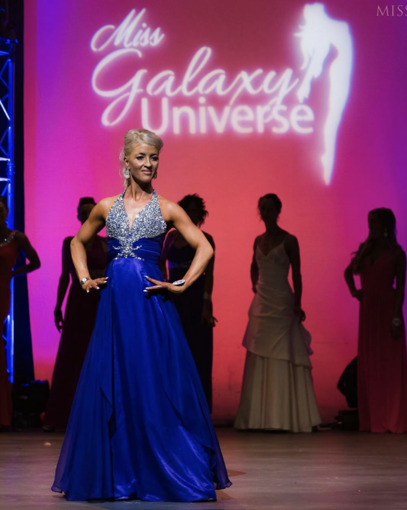 Alison Hood showcasing at the Miss Galaxy Universe bodybuilding competition